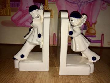 Keramische Franse Art Deco Pierrot clown boeksteunen beschikbaar voor biedingen
