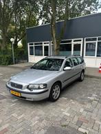 Volvo V70 2.4 140PK 2003 Grijs, Auto's, Volvo, Voorwielaandrijving, Stoelverwarming, 1800 kg, Leder en Stof
