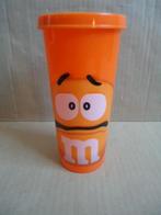 Oranje M&M beker met deksel., Ophalen of Verzenden, Zo goed als nieuw, Gebruiksvoorwerp