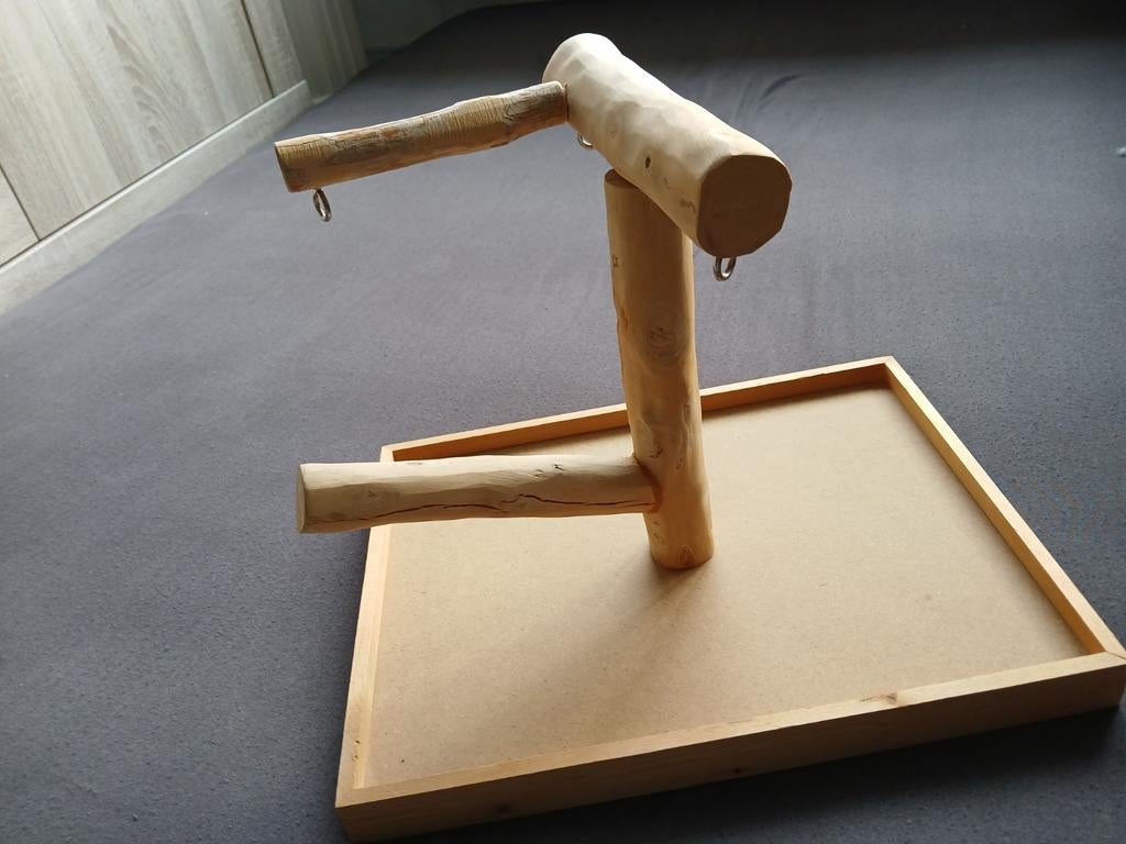 houten standaard met takken voor grotere vogels, Ophalen, Krabpaal