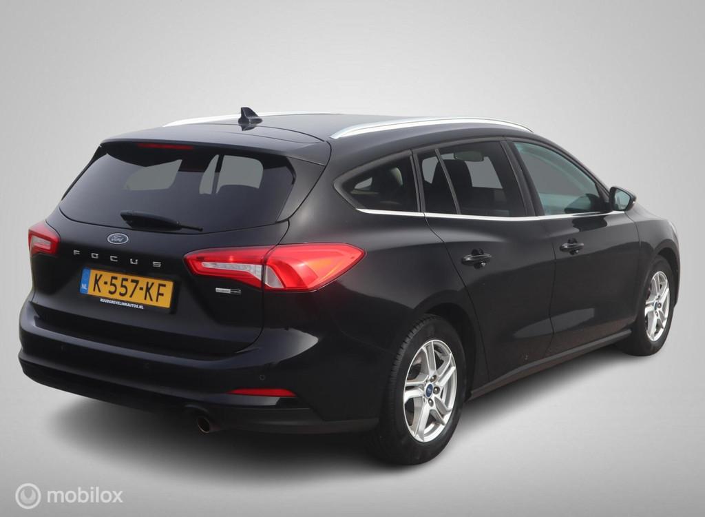 Ford Focus Wagon EcoBoost Hybrid 125 PK H6 Edition Navigatie, Stof, Gebruikt, Zwart, Origineel Nederlands