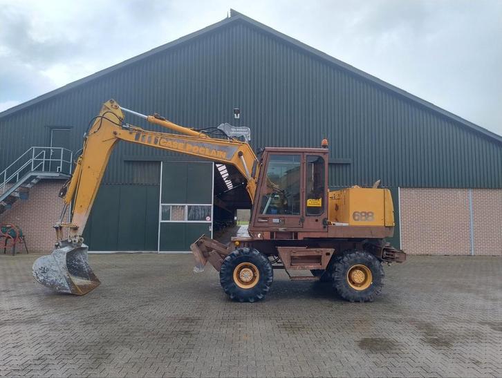 Case poclain 688p (bj1990), Zakelijke goederen, Machines en Bouw | Kranen en Graafmachines, Wiellader of Shovel, Ophalen of Verzenden