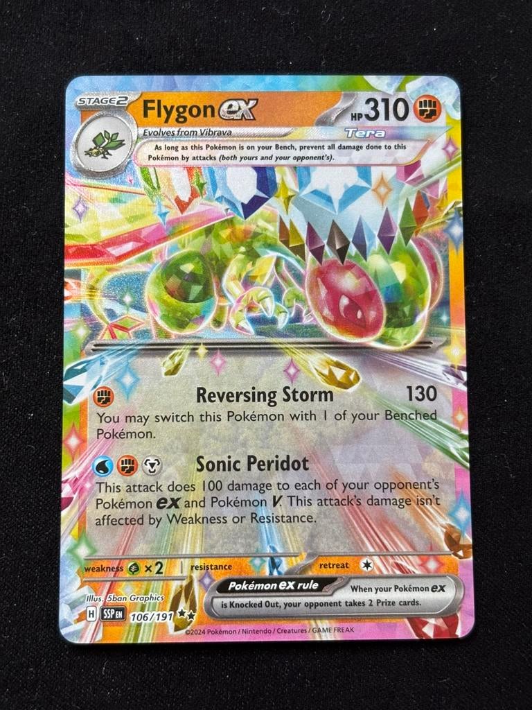 Flygon EX - Surging Sparks 106/191, Ophalen of Verzenden, Zo goed als nieuw