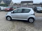 Toyota Aygo 1.0-12V Now, Auto's, Voorwielaandrijving, Euro 5, Stof, Gebruikt