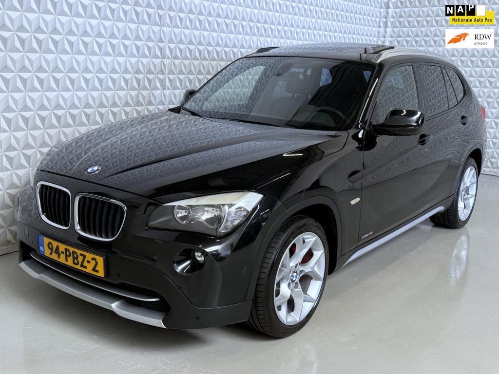 BMW X1 SDrive18i Executive met veel opties! 199.000km (2011), Auto's, BMW, Euro 5, Achterwielaandrijving, Zwart, 4 cilinders