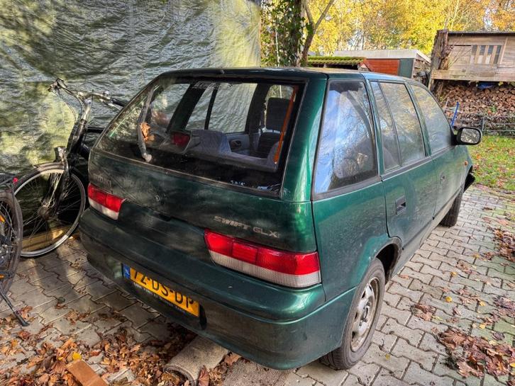 Suzuki Swift 1.0 GLX 5DRS AUT 1999 Groen met frontschade, Auto's, Suzuki, Particulier, Swift, Benzine, Hatchback, Automaat, Origineel Nederlands