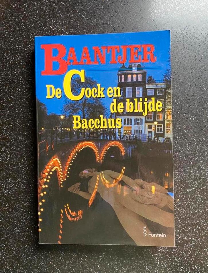 Boek Baantjer - De Cock en de blijde Bacchus, Boeken, Detectives, Zo goed als nieuw, Tv-bewerking, Ophalen of Verzenden