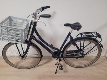Cortina u5 damesfiets met krat te koop beschikbaar voor biedingen