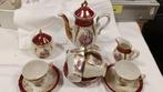 Luster theeservies met goud en rococo-taferelen, Ophalen of Verzenden