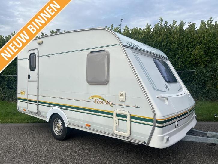SWIFT 410 TOSCANE VOORTENT EN LUIFEL 6995,, Caravans en Kamperen, Caravans, Bedrijf, tot en met 4, 750 - 1000 kg, Treinzit, Swift