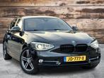 BMW 1-serie 125i High Executive Sport | Full Options | Zeer, Achterwielaandrijving, Gebruikt, Zwart, Navigatiesysteem