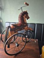 Paard op driewieler, Ophalen