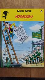Lucky Luke - Vogelvrij - Stripboek 1e druk, Eén stripboek, Ophalen of Verzenden, Zo goed als nieuw, Morris