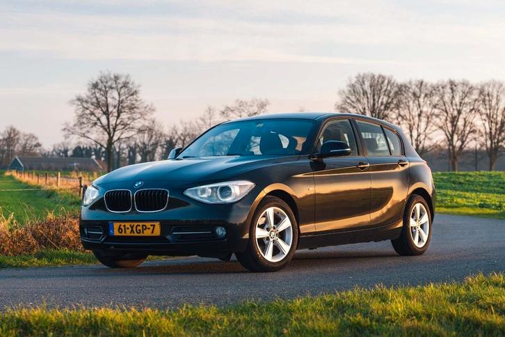 BMW 1-Serie 116I 100KW 5DR 2012 Zwart, Auto's, BMW, Particulier, 1-Serie, Airbags, Airconditioning, Bluetooth, Centrale vergrendeling