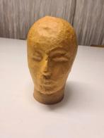 hoofd voor pruiken, Ophalen