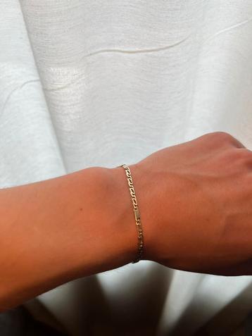 Gouden valkoog armband 14 karaat beschikbaar voor biedingen