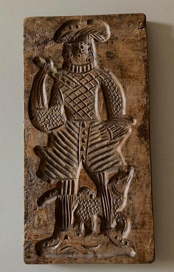 antieke speculaasplank met Zwarte Piet of jager met hond beschikbaar voor biedingen