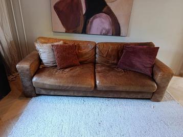 Cognac leren bank – stoer en comfortabel beschikbaar voor biedingen