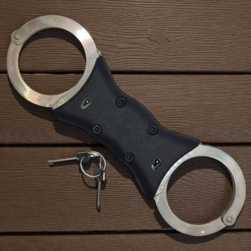 Sterke Kel-Met roestvrijstalen handboeien beschikbaar voor biedingen