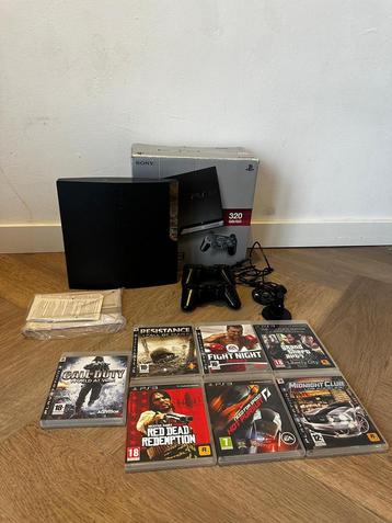 Playstation 3 met doos en 7 spellen beschikbaar voor biedingen