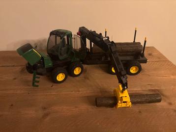Bruder John Deere 1210E met Boomstamgrijper. Als nieuw beschikbaar voor biedingen
