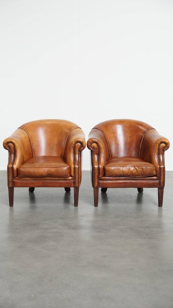 Set van 2 aantrekkelijke schapenleren clubfauteuils, Huis en Inrichting, Fauteuils, Gebruikt, Leer, 75 tot 100 cm, 75 tot 100 cm