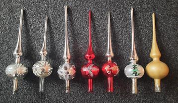 7 oude versierde kerstboom pieken beschikbaar voor biedingen