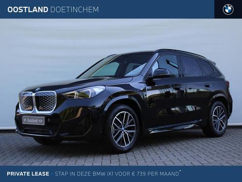 BMW iX1 eDrive20 M Sport / Panoramadak / Trekhaak / Sportsto, Auto's, BMW, Bedrijf, Te koop, iX1, Achteruitrijcamera, Alarm, Bochtverlichting