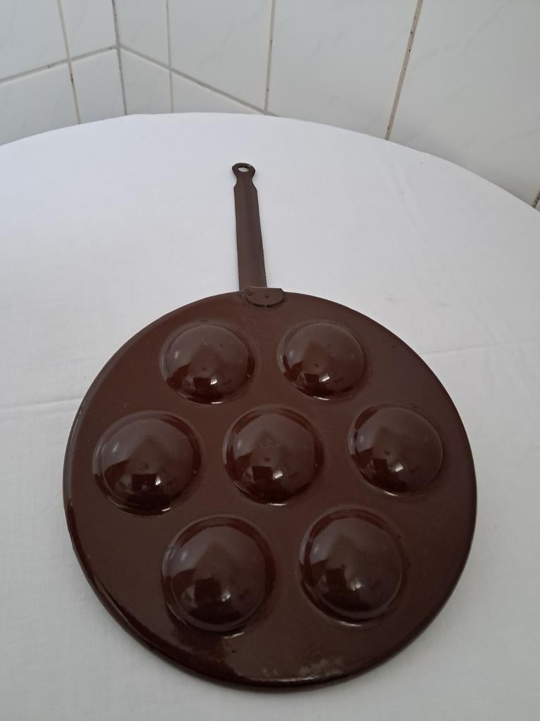 Poffertjes pan, Ophalen