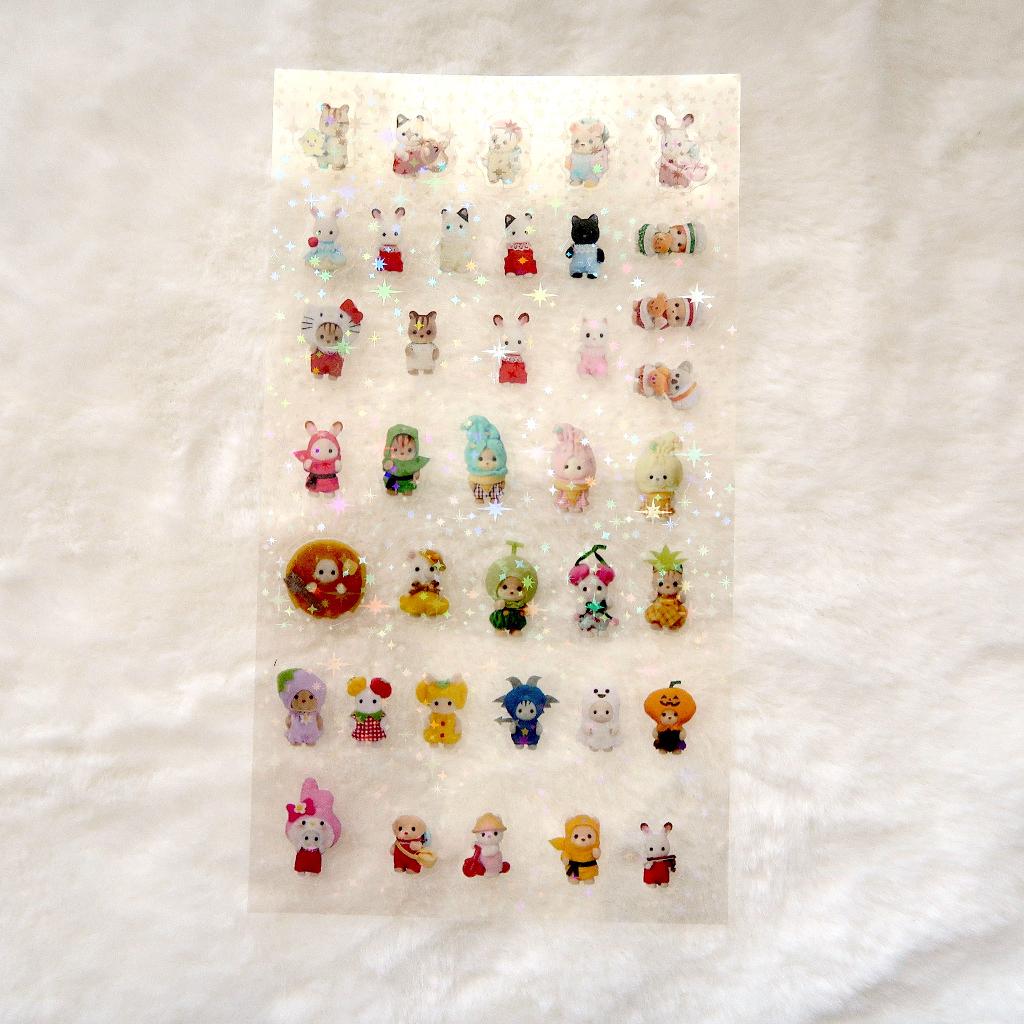 Sylvanian Family Stickervel met hologram ster afwerking, Verzamelen, Verzenden, Nieuw, Plaatje, Poster of Sticker