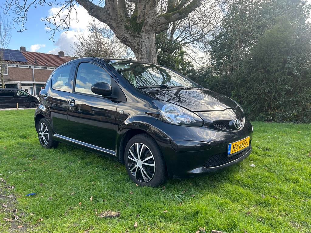 Toyota Aygo 1.0 12V Vvt-i 5DRS 2007 Zwart, Auto's, Toyota, Voorwielaandrijving, 4 stoelen, Bedrijf, Handgeschakeld