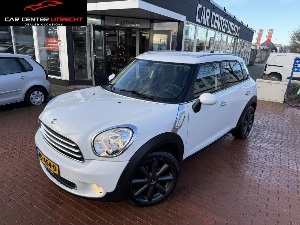 MINI Countryman 1.6 Cooper | €250,- KORTING & NW APK | nav, Auto's, Mini, Gebruikt, Euro 6, Leder en Stof, Wit