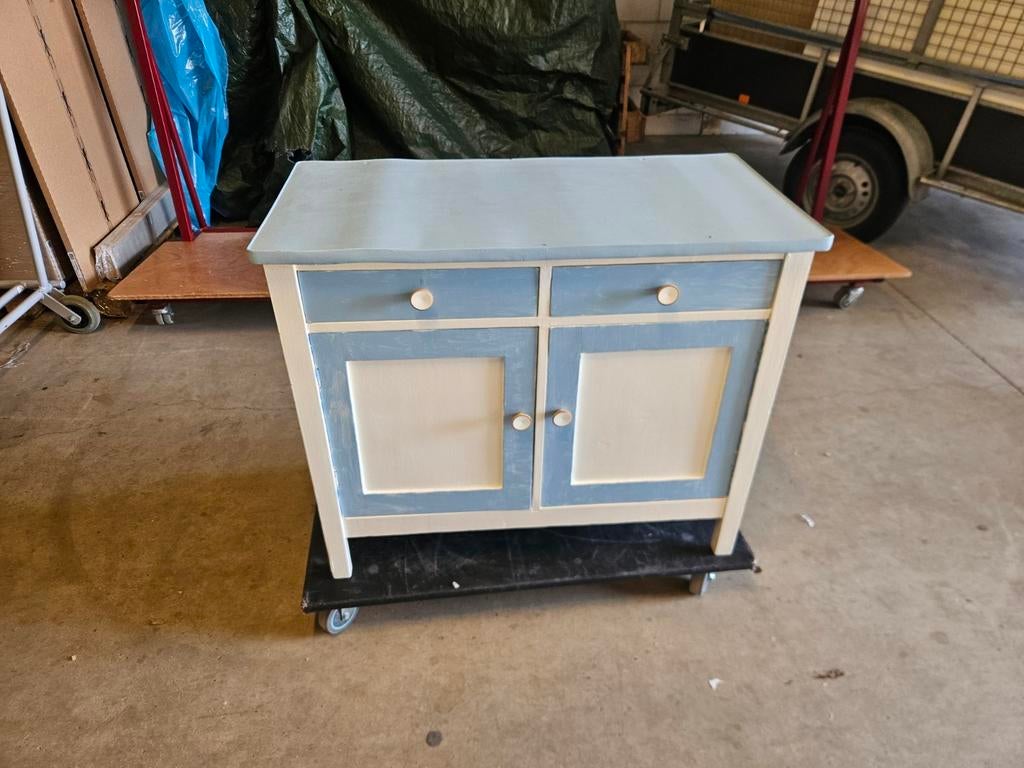 Kastje met lades en deurtjes, Ophalen