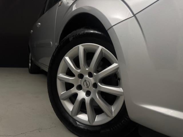 Opel Zafira 1.8 Temptation *7 persoons* (bj 2007), Gebruikt, 4 cilinders, Origineel Nederlands, Zilver of Grijs