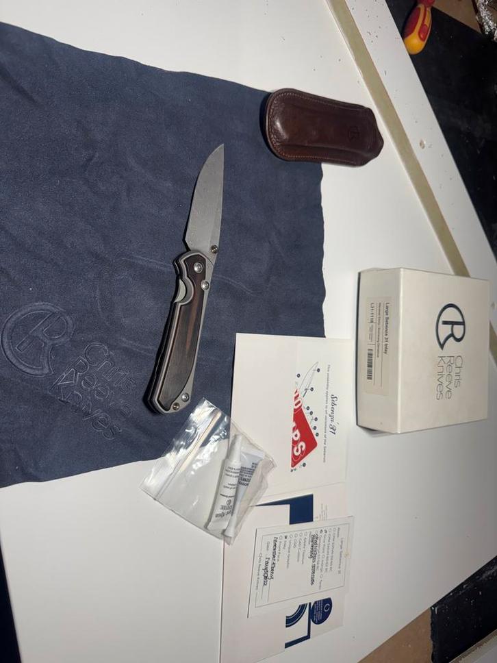 Chris Reeve Sebenza 31 Macassar Ebony Boomerang Damascus, Hobby en Vrije tijd, Overige Hobby en Vrije tijd, Zo goed als nieuw