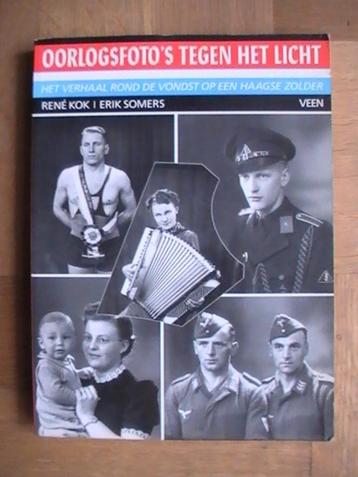 boek - Oorlogsfoto's tegen het licht - Rene Kok / Den Haag beschikbaar voor biedingen