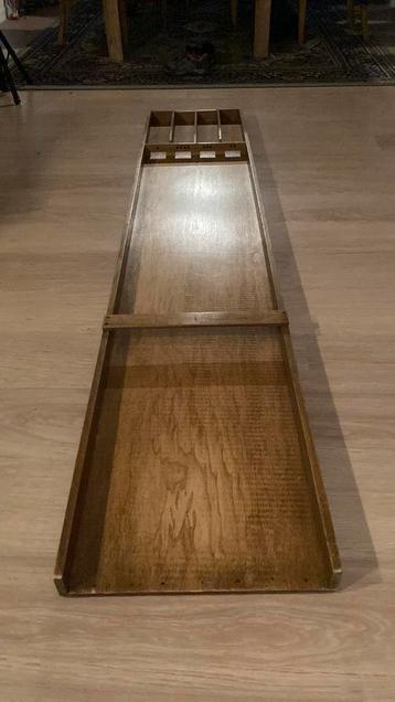 Sjoelbak met 30 schijven beschikbaar voor biedingen