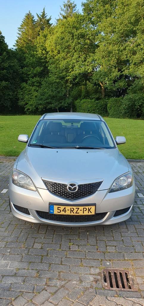 Mazda 3 1.4 benzine 2005 Grijs, Auto's, Mazda, Particulier, Benzine, C, Hatchback, Handgeschakeld, Origineel Nederlands, Zilver of Grijs