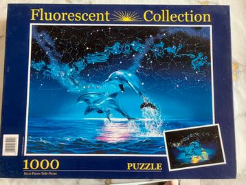 Fluorescent collectie dolfijnen beschikbaar voor biedingen