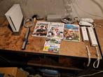 Nintendo wii met 2 motion plus controllers en 4 topspellen, Spelcomputers en Games, Spelcomputers | Nintendo Wii, Ophalen of Verzenden