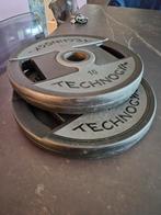2x technogym 10 kilo schijven, Sport en Fitness, Ophalen, Zo goed als nieuw, Halterschijven