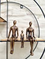Bronzen beeld van zittend koppel met kind, Ophalen