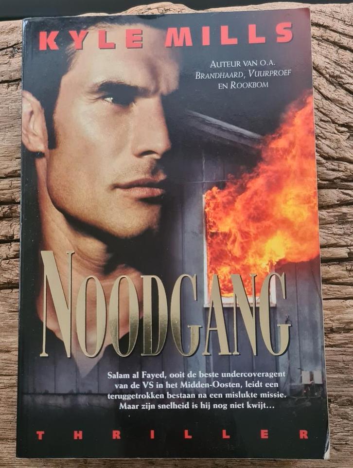 K. Mills - Noodgang, Boeken, Thrillers, Zo goed als nieuw, Ophalen of Verzenden