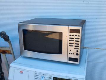 Goed werkende magnetron, met vele functies. beschikbaar voor biedingen