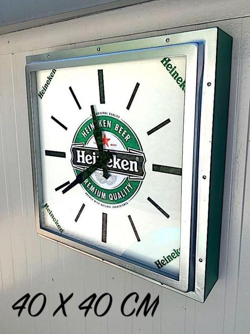 Te koop mancave zware oude metalen Heineken cafe wand klok ., Verzamelen, Biermerken, Zo goed als nieuw, Reclamebord, Plaat of Schild