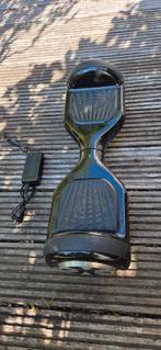Hoverboard zwart met oplader. Bieden van € 60,-, Ophalen