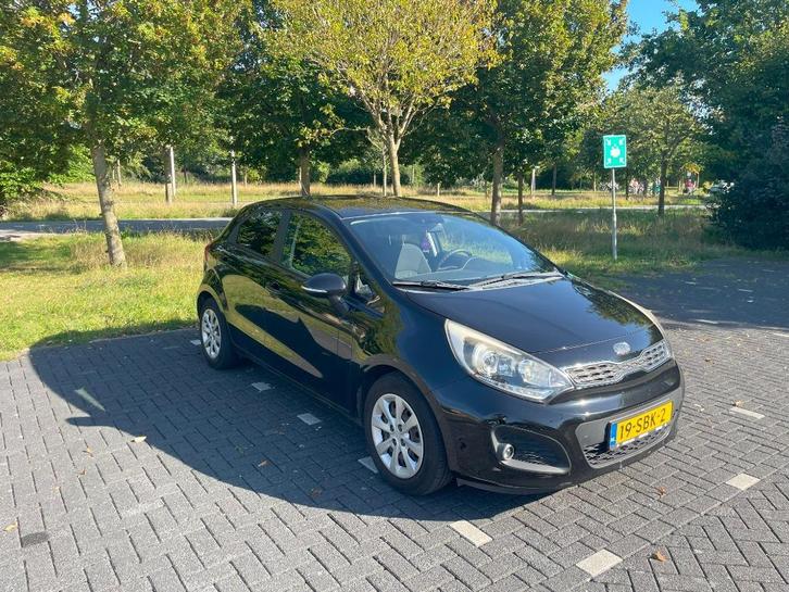 Kia Rio 1.2 - NL - 2011 Zwart - Merkspecialist onderhouden, Auto's, Kia, Particulier, Rio, ABS, Airbags, Airconditioning, Alarm