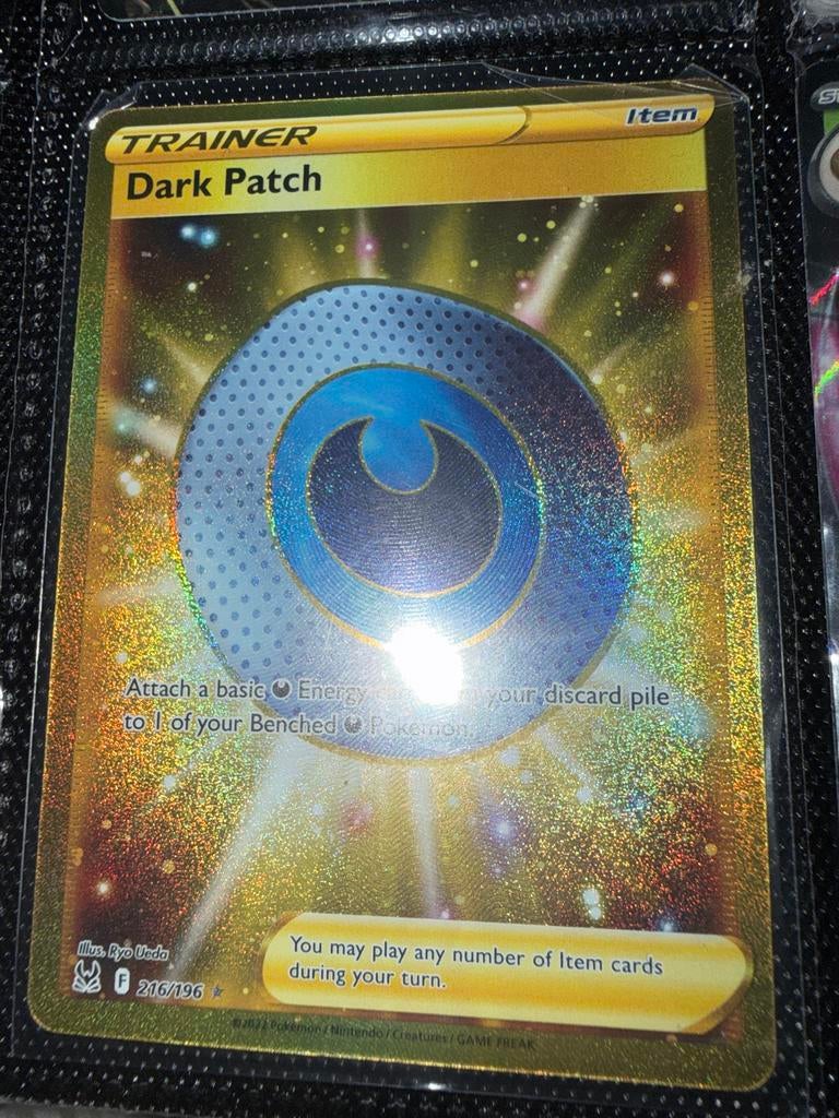 Dark Patch 216/196 - Gouden Trainer Kaart, Ophalen of Verzenden, Zo goed als nieuw, Losse kaart, Foil