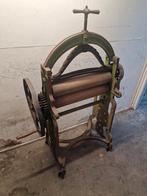 Antieke mangel Smith & Paget, Ophalen