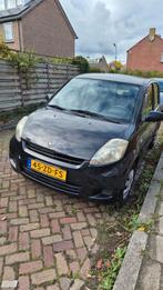Daihatsu Sirion 1.0 51KW 2008 Zwart, Auto's, Daihatsu, Voorwielaandrijving, Zwart, Handgeschakeld, 3 cilinders